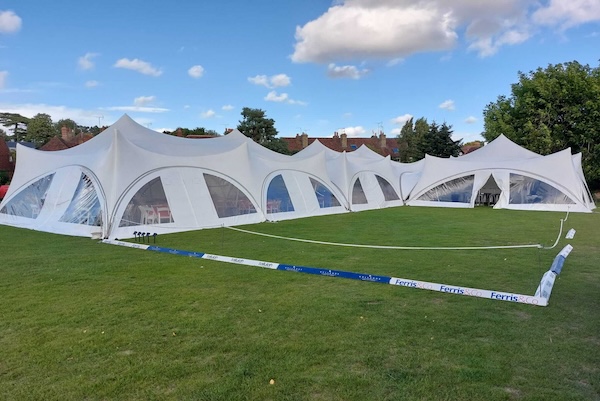 Multiple Capri Marquees On Field